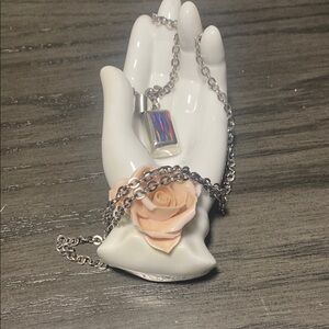 Elegant Silver Necklace with Iridescent Pendant